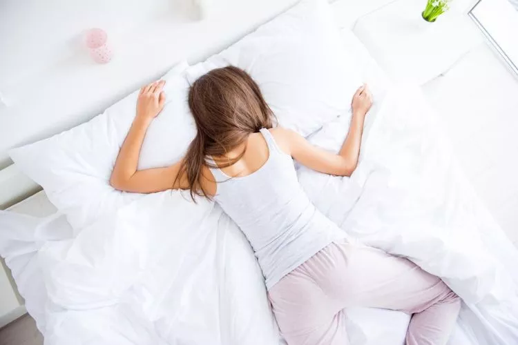 Why do women sleep with one leg up? all you need to know